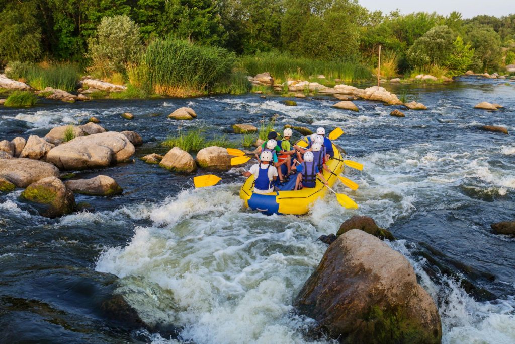 Professional rafting excursion on the scenic Cabriel River, a key part of the Finca Calderón adventure and wine tasting package.