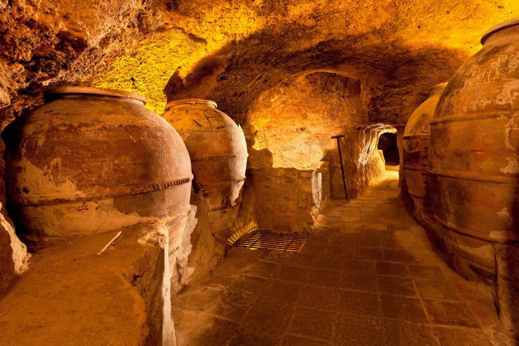 Exploring the historical underground wine caves and deposits in the La Villa district of Requena, a key cultural stop in the Heritage Tasting tour.